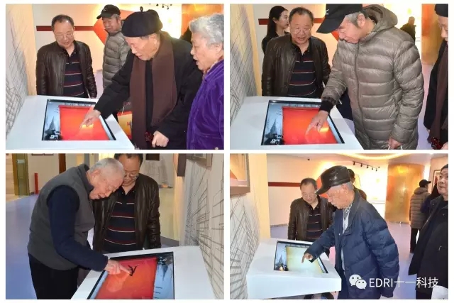 1496419643103588.jpg 老領(lǐng)導(dǎo)和大師紛紛在簽名臺(tái)前簽名.webp.jpg